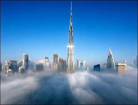 Clouds fog Burj khalifa buildings skyscrapers Dubai UAE 2025