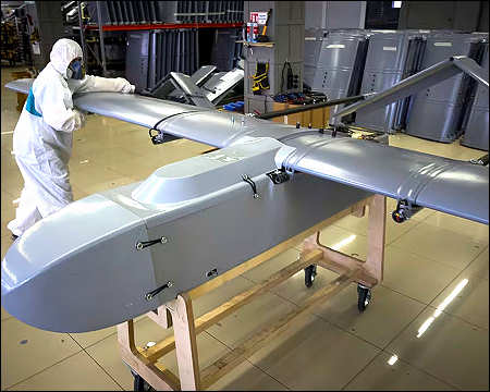 Worker Ukrainian combat drone Fire Point secret factory 2025