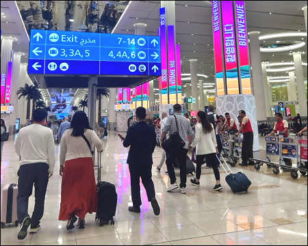 Passengers Dubai airport UAE 2025