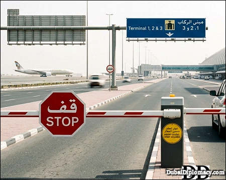 Traffic barrier arm with stop sign