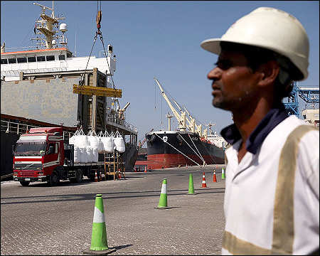 Worker cargo Fujairah port UAE, May 6, 2026