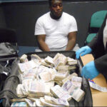 Manchester Airport gang smuggling money Dubai UAE June 5, 2026