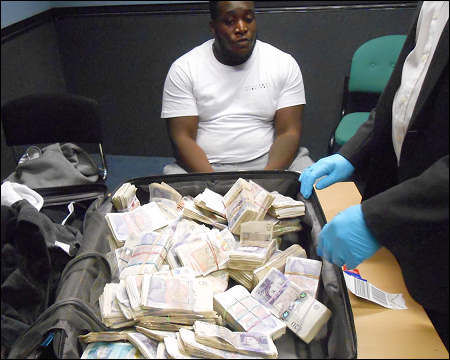 Manchester Airport gang smuggling money Dubai UAE June 5, 2026